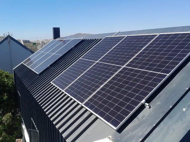 Rooftop solar panels installed on a home in Bloubergstrand, Cape Town