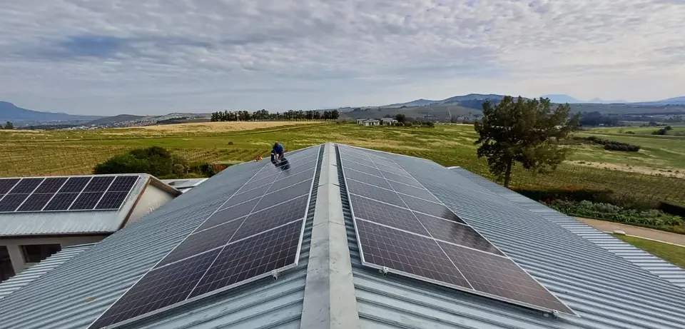 Rooftop solar panel installation on a wine-farm property in the Cape Winelands