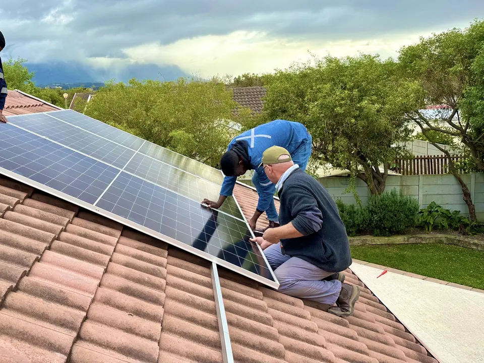 DigiGo installers mounting rooftop solar panels, Cape Town